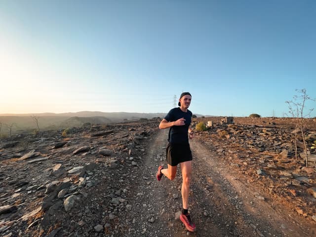 Samuel running in the sunset